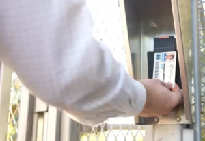 Fixed Door Reader Scanning a Security Badge